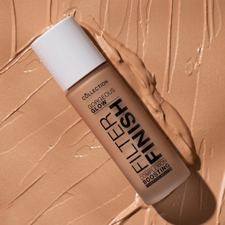 Gorgeous Glow Filter Finish in een stijlvolle, transparante verpakking met een witte dop en een warme, bronzen tint.