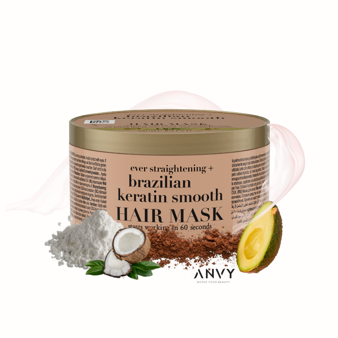 Brazilian Keratin Smooth Masker van OGX in een ronde, gouden verpakking met ingrediënten zoals kokos en avocado.