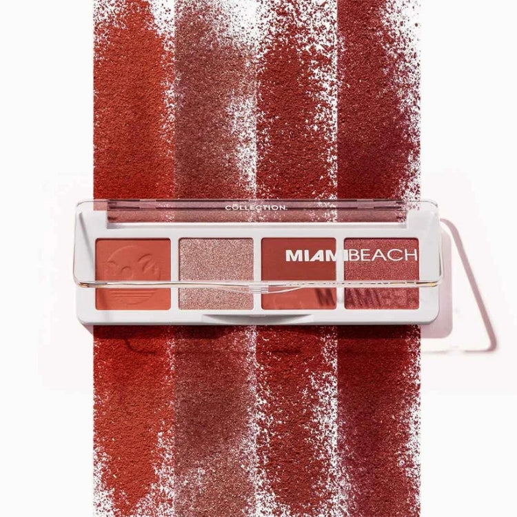 Mini Eyeshadow Palette Miami Beach met warme tinten in een stijlvolle, witte verpakking en glanzende texturen.