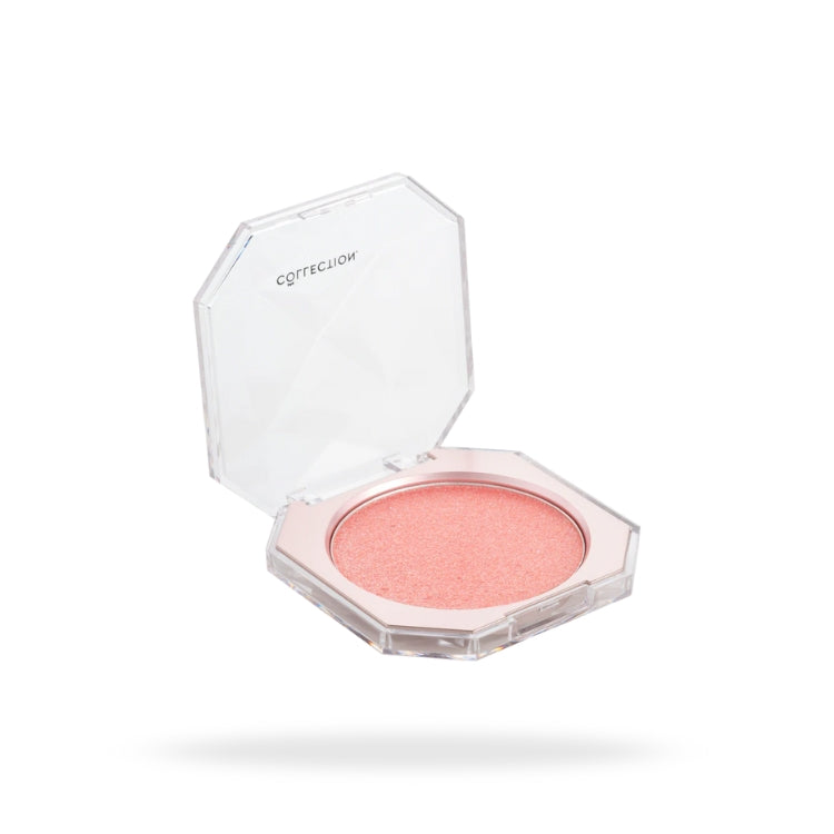 Diamond Shine Highlighter in een octagonale verpakking, met een zachte roze kleur en glanzende afwerking.