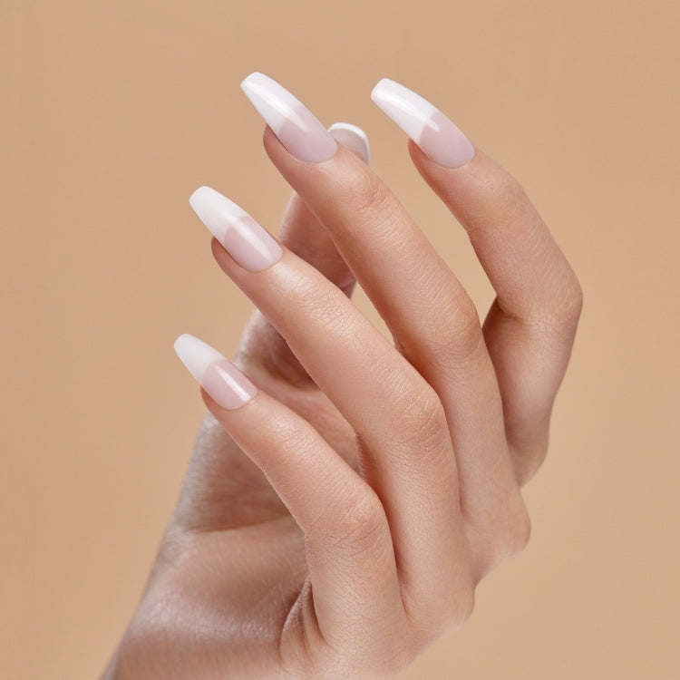 Acrylic French Nude Nails - Leilani in een elegante, lange vorm met een zachte nude kleur en witte tips.